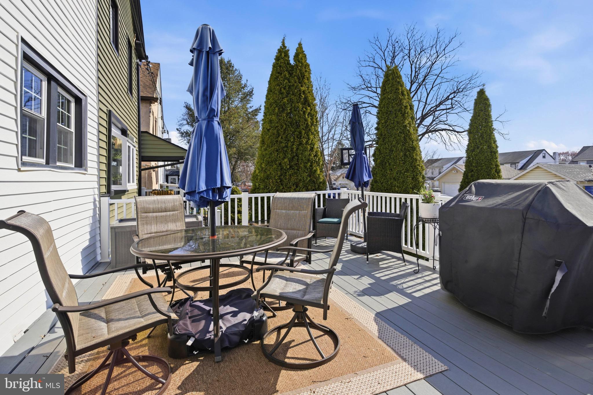 277 Ballymore Road Springfield, PA 19064 - Photo 29 of 34 a view of a dinning tables and chairs in the patio