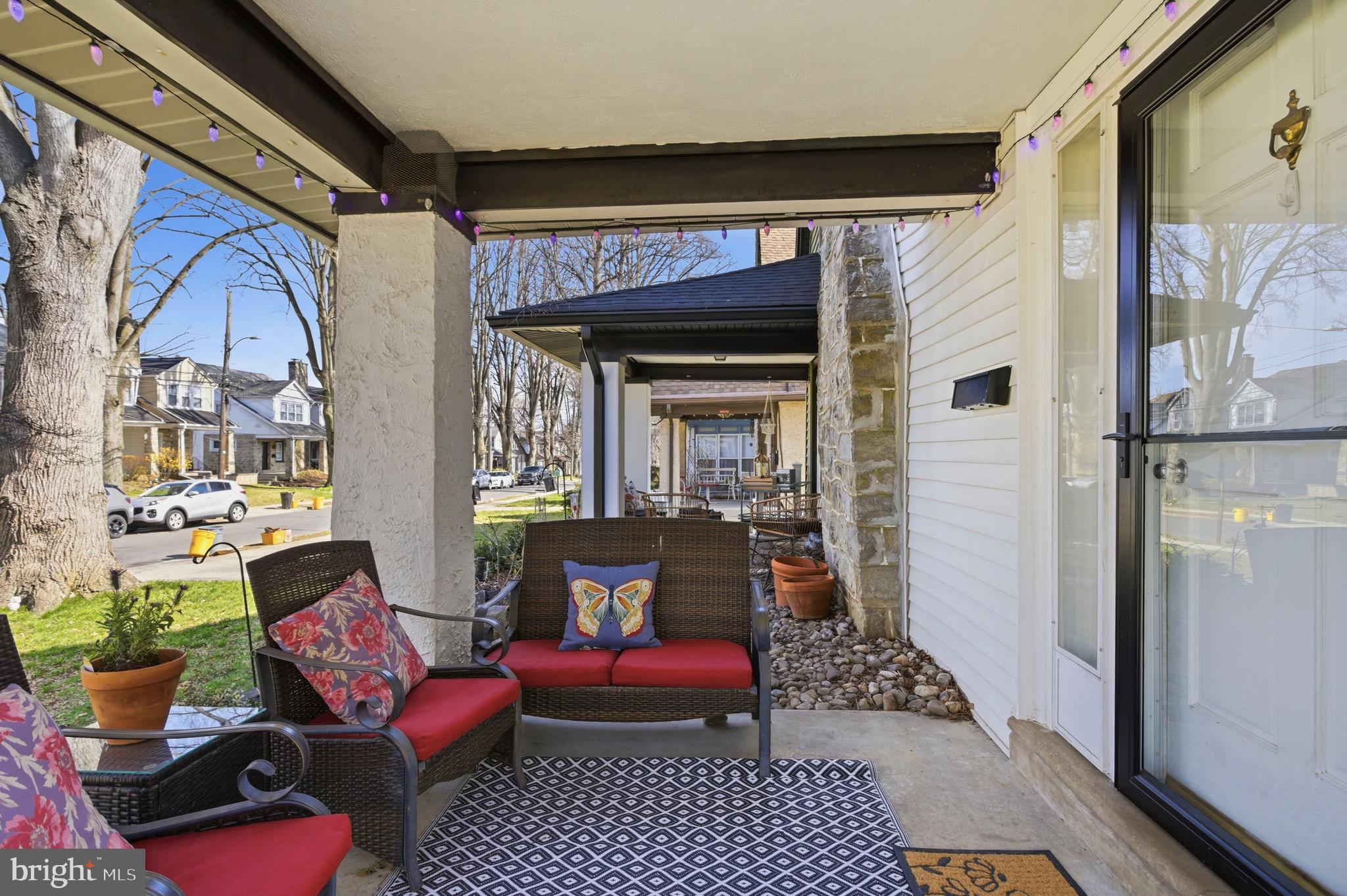 277 Ballymore Road Springfield, PA 19064 - Photo 4 of 34 a balcony with furniture and rug
