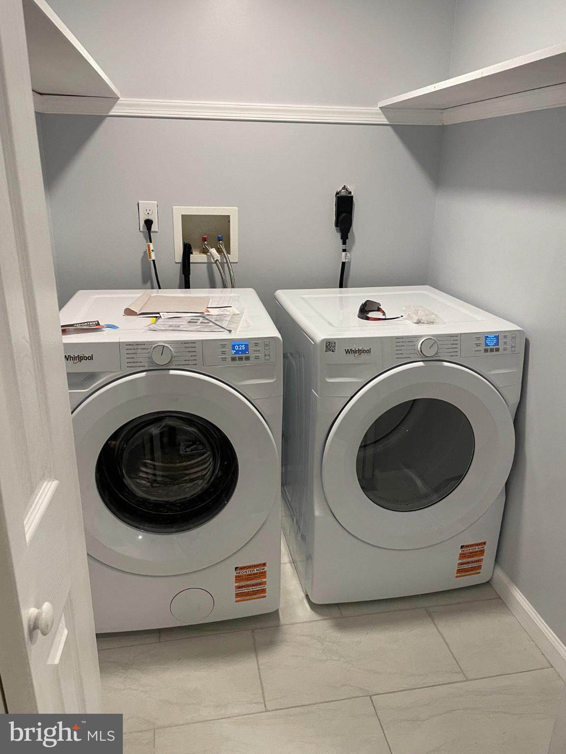 2016 Gatewood Place Silver Spring, MD 20903 - Photo 11 of 24 a utility room with dryer and washer