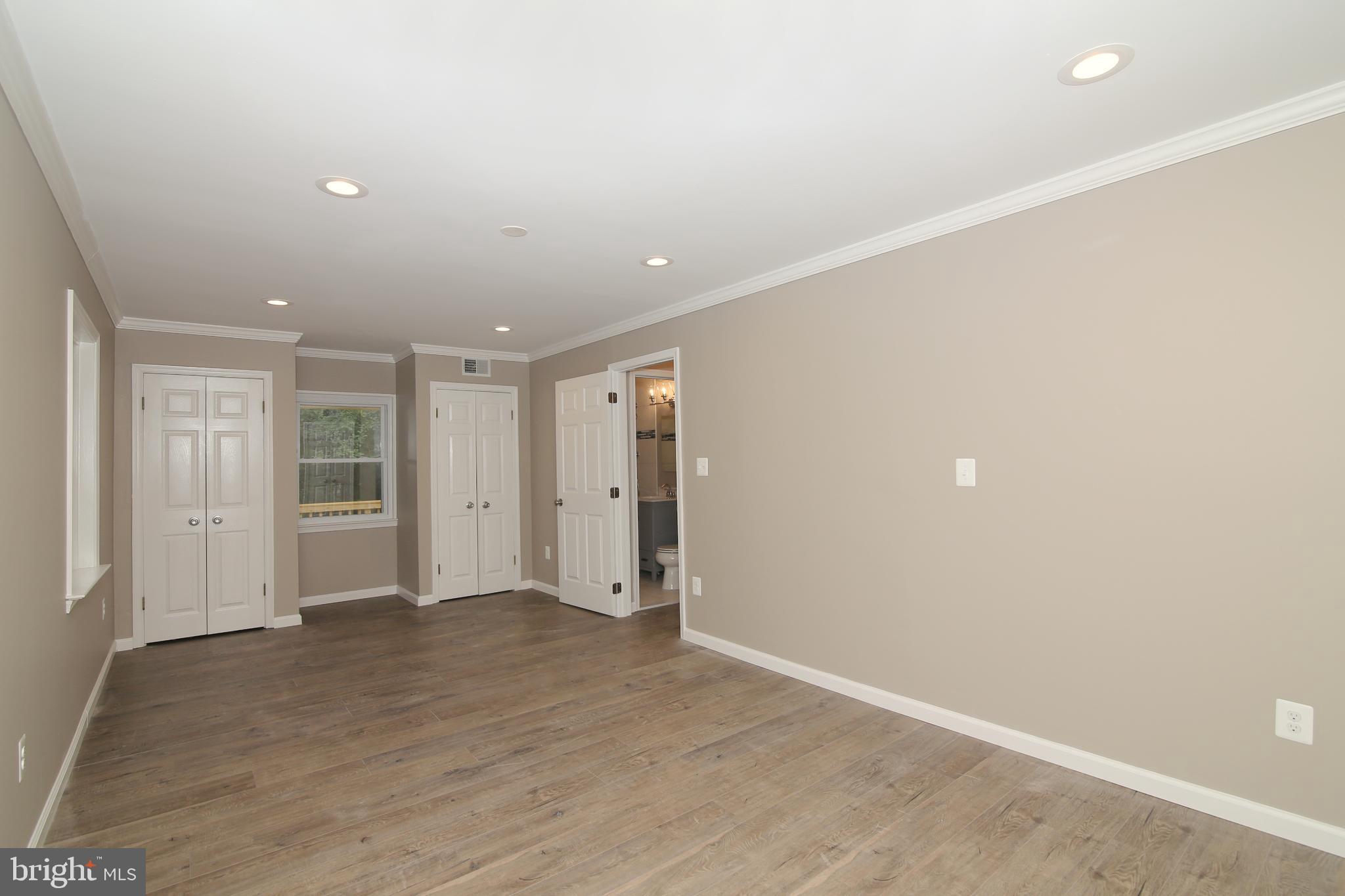 5535 Belfast Place Springfield, VA 22151 - Photo 18 of 41 Master Bedroom with 4 Closets