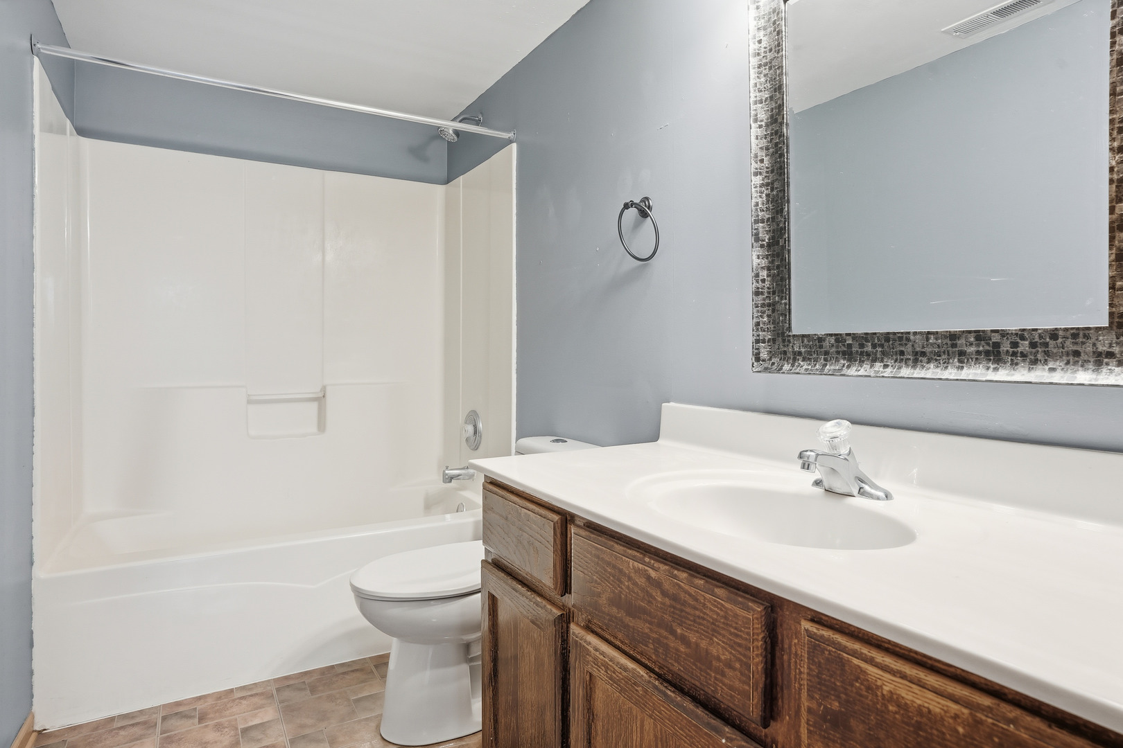 1986 Brimstone Road Romeoville, IL 60446 - Photo 16 of 32 a bathroom with a sink a toilet and shower