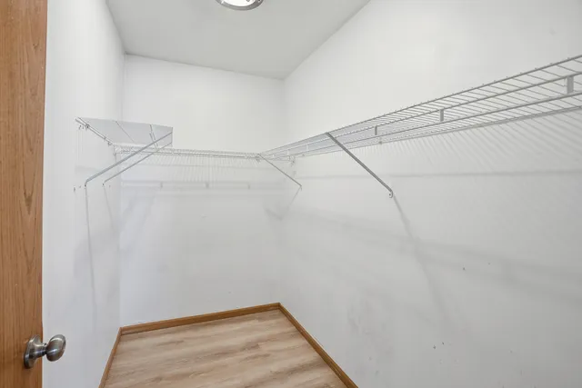 a view of a room with racks on the wall