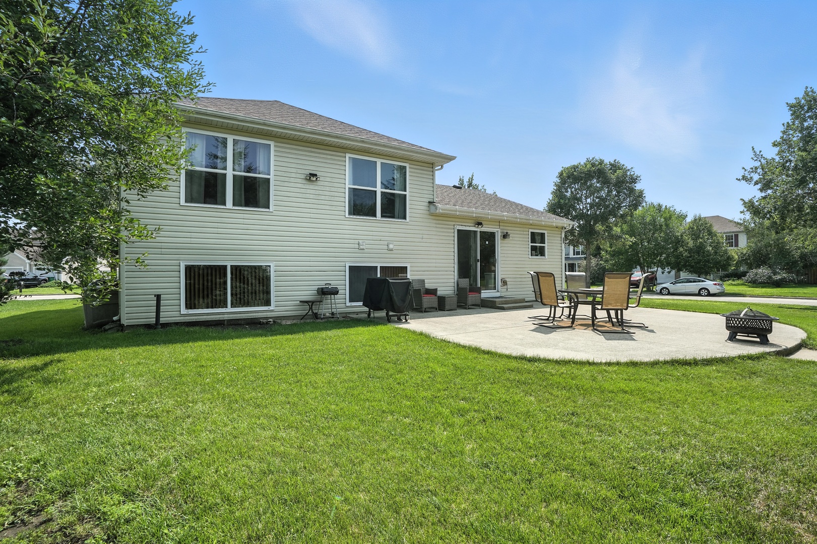 1986 Brimstone Road Romeoville, IL 60446 - Photo 32 of 32 a view of a house with swimming pool and a yard