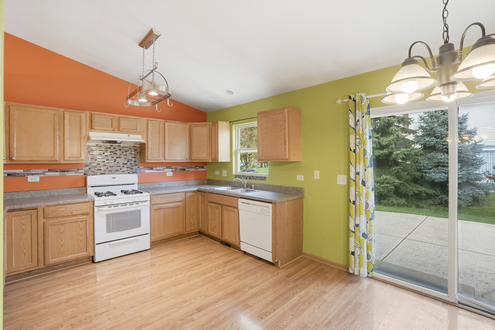 1986 Brimstone Road Romeoville, IL 60446 - Photo 6 of 32 a kitchen with stainless steel appliances granite countertop a stove a sink and a refrigerator