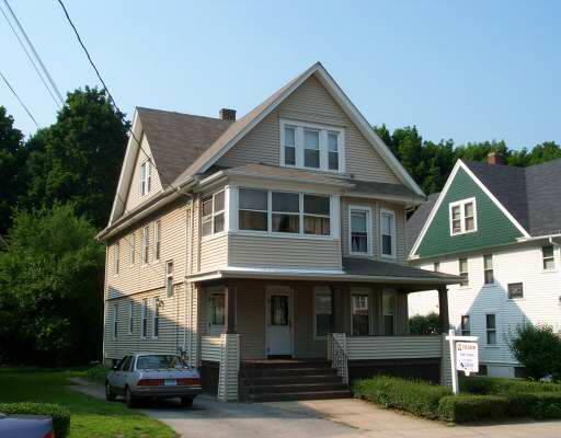 34 Jackson Street Ansonia, CT 06401 - Photo 1 of 1 a front view of a house with a yard