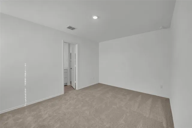 a bathroom with a sink vanity and a mirror