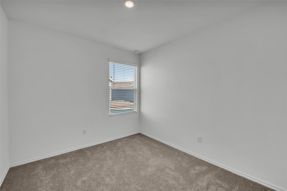 309 Marty Allen Loop Jarrell, TX 76537 - Photo 6 of 30 a view of a room that has a window in it