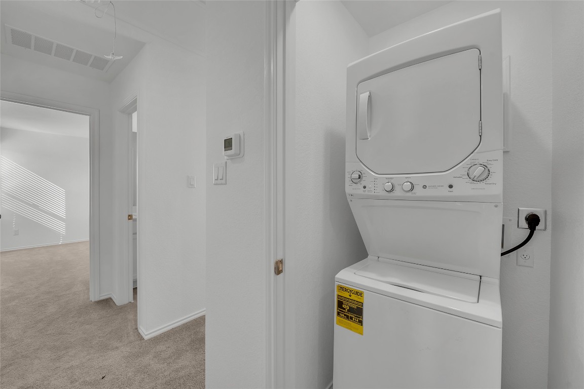 309 Marty Allen Loop Jarrell, TX 76537 - Photo 10 of 30 a utility room with dryer and washer