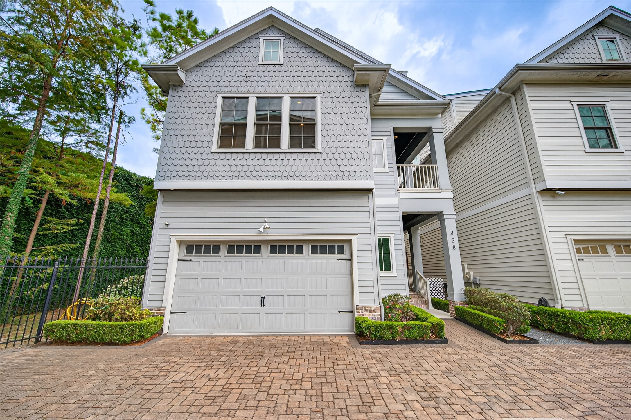 428 Marshall Street Houston, TX 77006 - Photo 2 of 36 a front view of a house with garden