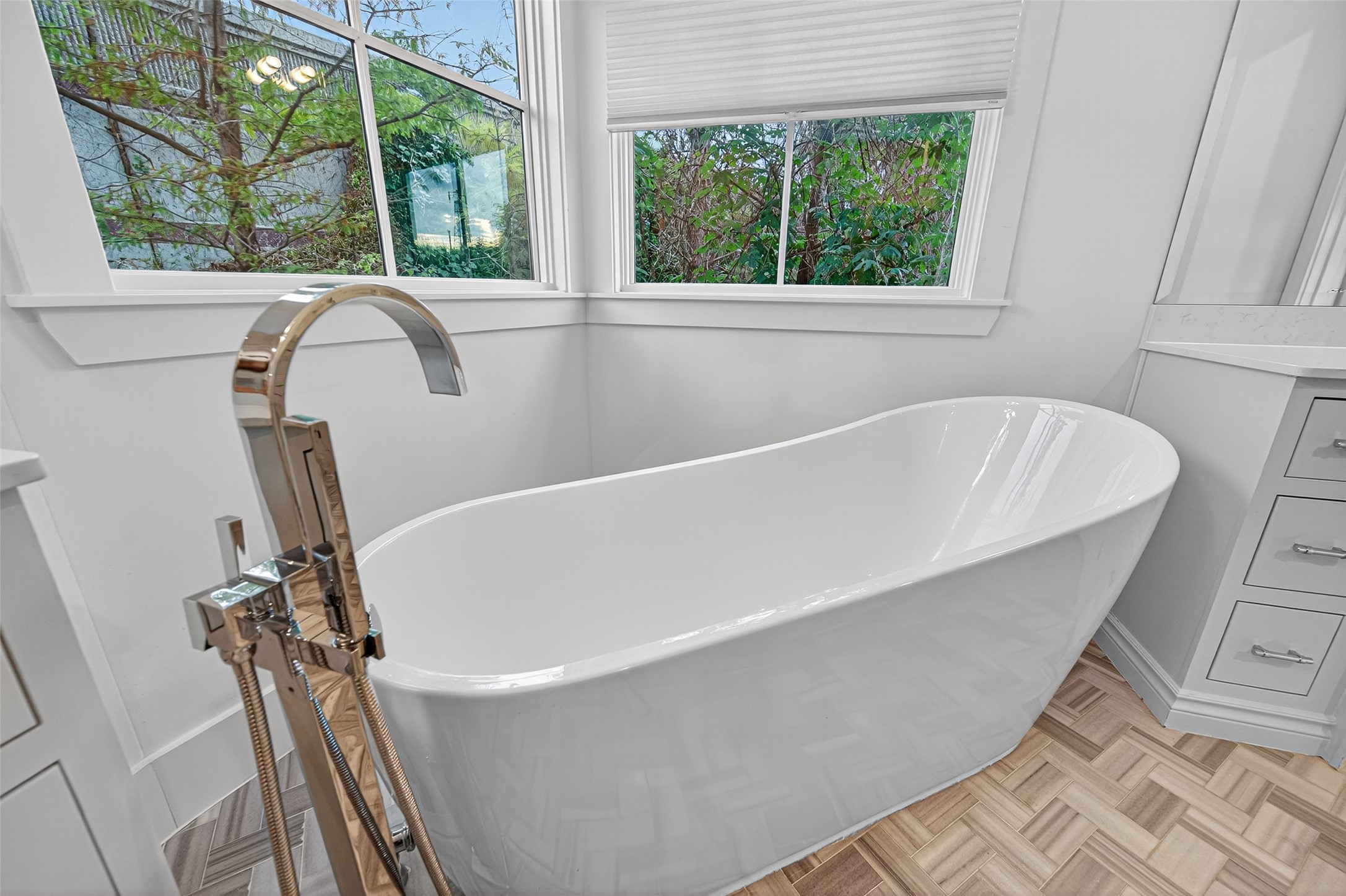 428 Marshall Street Houston, TX 77006 - Photo 25 of 36 a white bath tub sitting in a bathroom