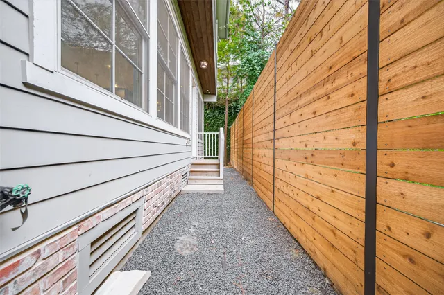 a house with trees in front of it