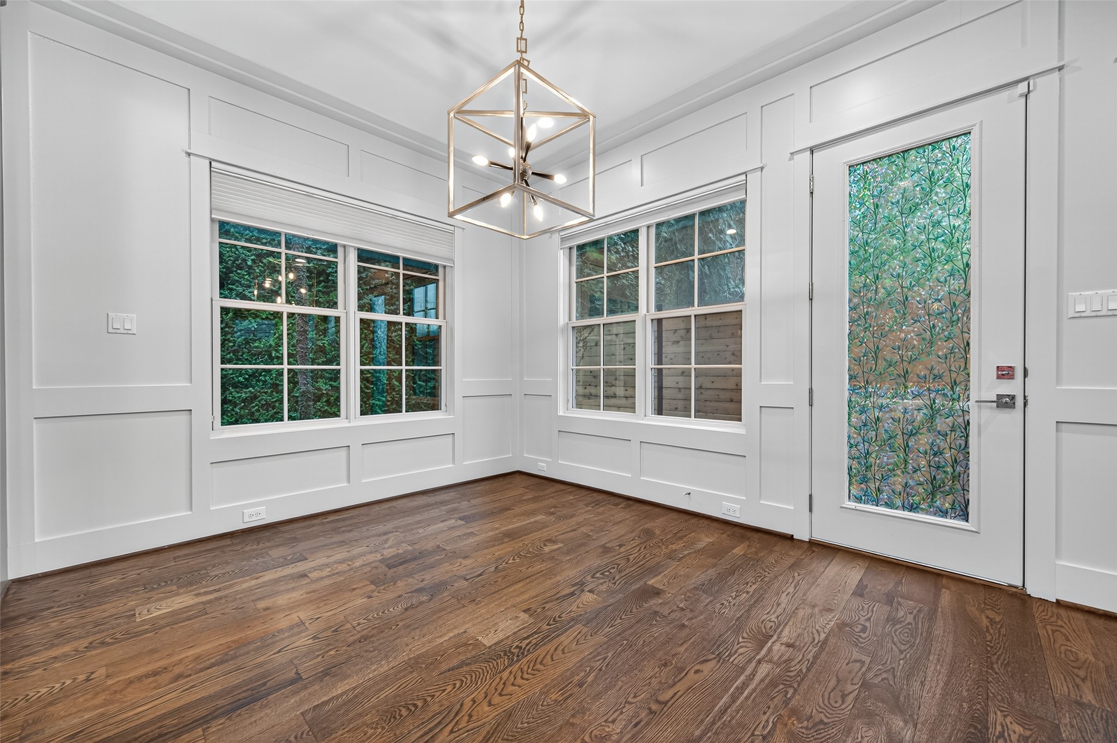 428 Marshall Street Houston, TX 77006 - Photo 8 of 36 a view of an empty room with wooden floor and a window