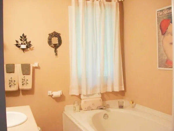 a bathroom with a sink and a bathtub
