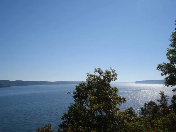 a view of lake with mountain in background