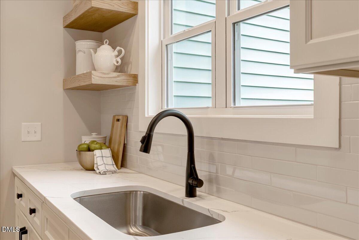 2280 Heartland Road Battleboro, NC 27809 - Photo 17 of 46 a kitchen with a sink and a window