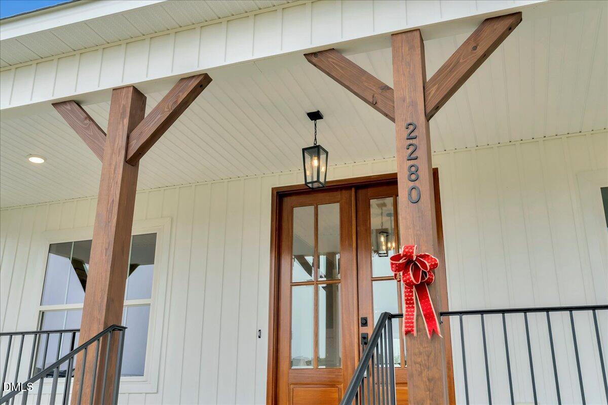 2280 Heartland Road Battleboro, NC 27809 - Photo 42 of 46 a front view of a house with wooden floor