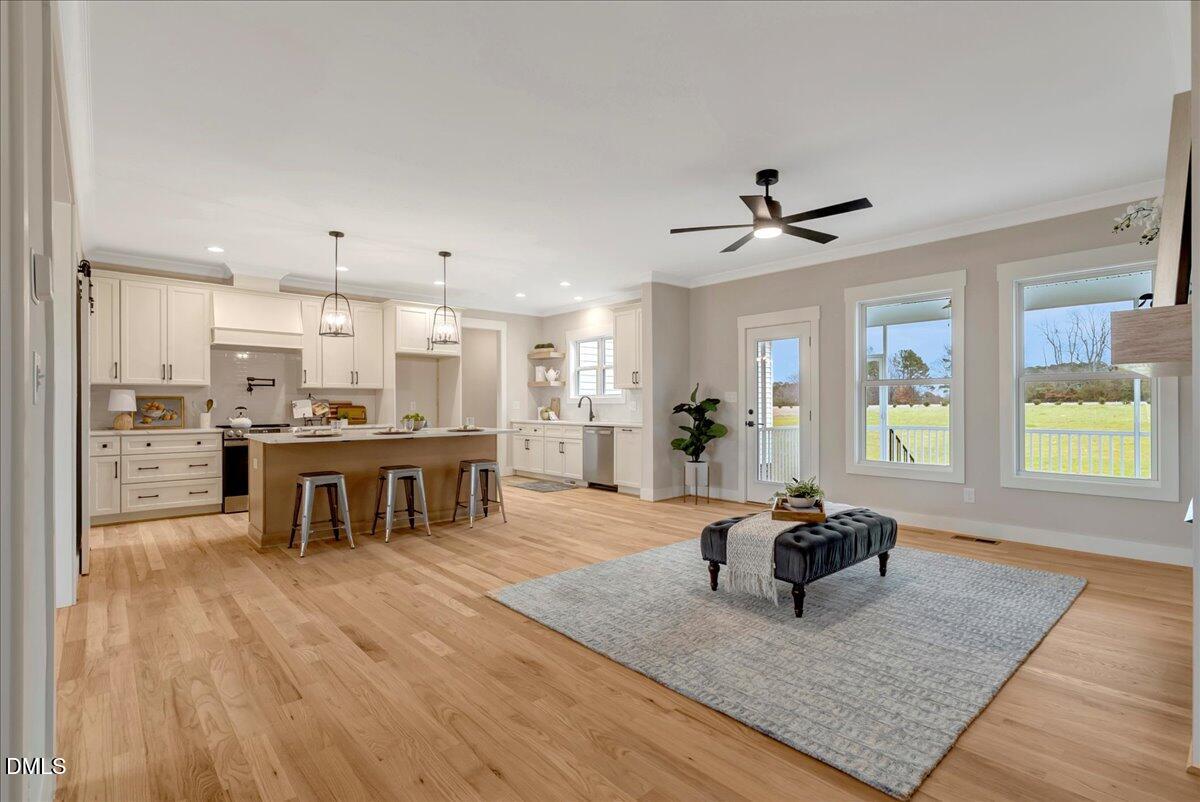 2280 Heartland Road Battleboro, NC 27809 - Photo 5 of 46 a living room with furniture and kitchen view