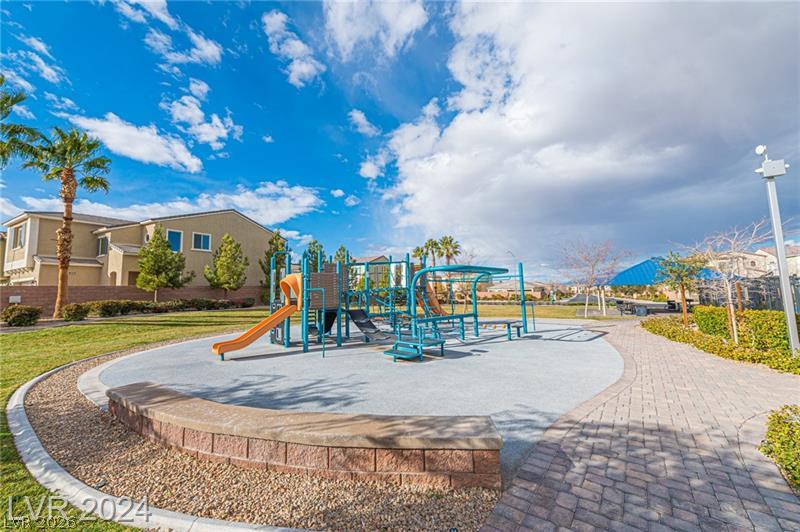 9056 Tony Ridge Avenue Las Vegas, NV 89148 - Photo 29 of 32 A vibrant neighborhood park with a colorful playground awaits family enjoyment.