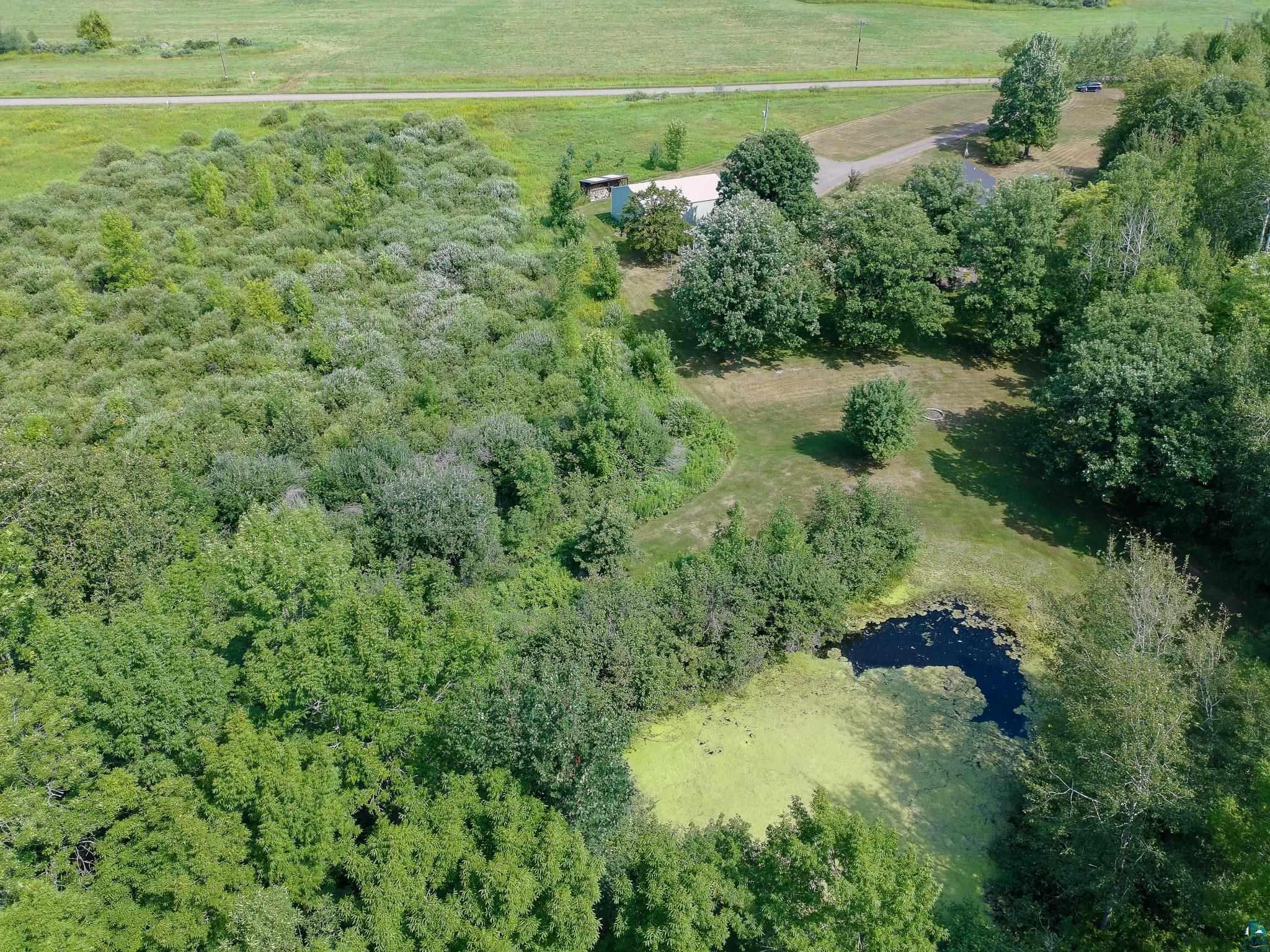5080 Tower Road Moose Lake, MN 55767 - Photo 43 of 49 Expansive property with a natural pond and surrounding mature trees