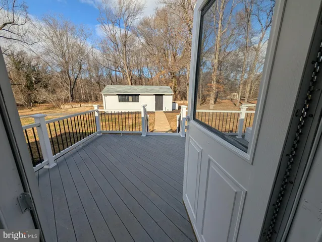a view of deck and wooden floor