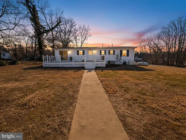 a swimming pool with outdoor seating