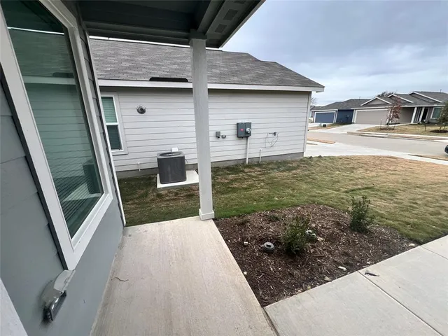 a house view with a backyard space