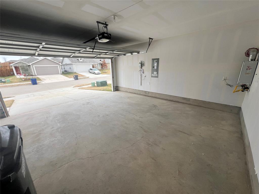 9012 Red Fox Trail McKinney, TX 75071 - Photo 32 of 35 a view of room with garage