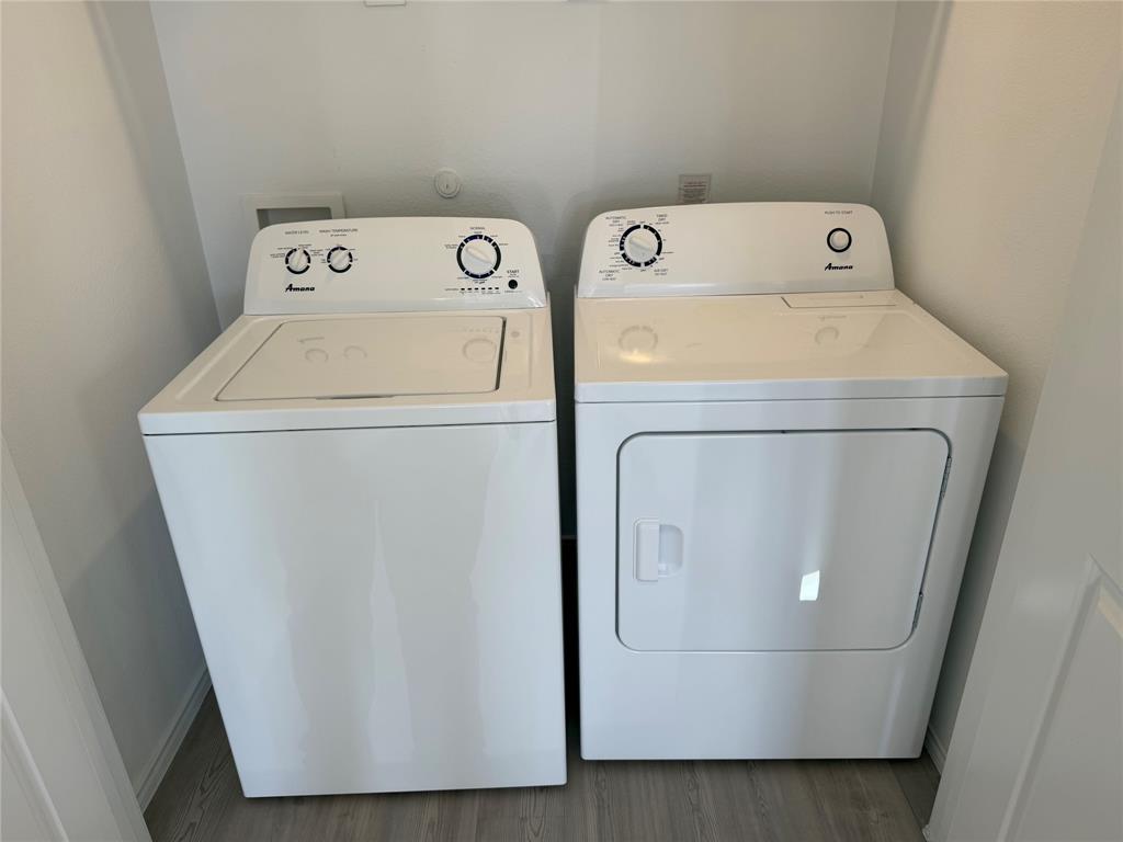 9012 Red Fox Trail McKinney, TX 75071 - Photo 10 of 35 a utility room with dryer and washer