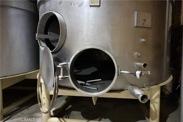 a view of a lake with a field