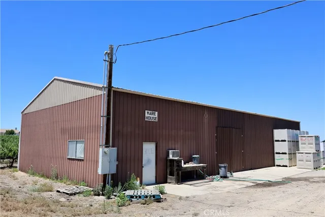 a view of a chairs and table in the patio