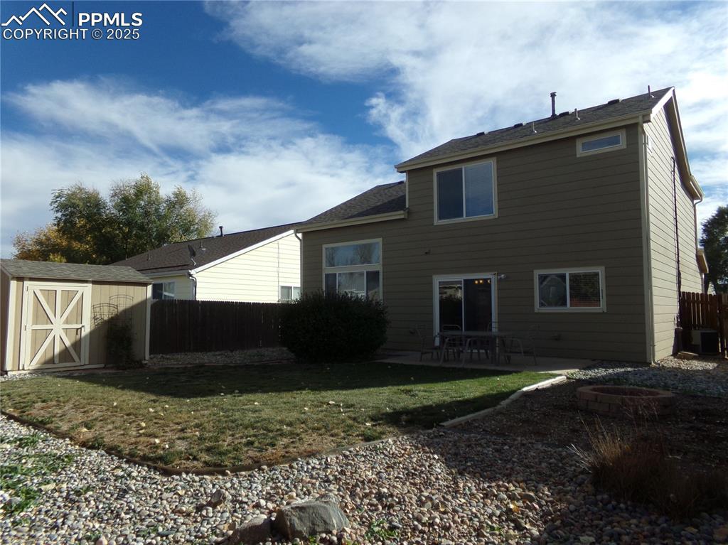 895 Rancher Drive Fountain, CO 80817 - Photo 28 of 29 a view of a house with a yard
