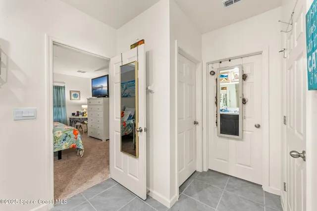 a view of a livingroom with tub and workspace