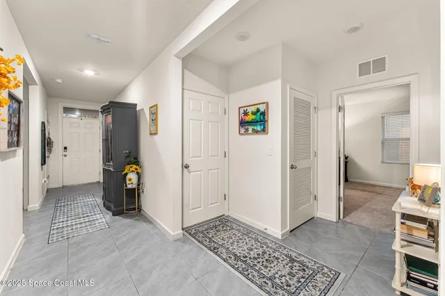 a view of livingroom with furniture and window