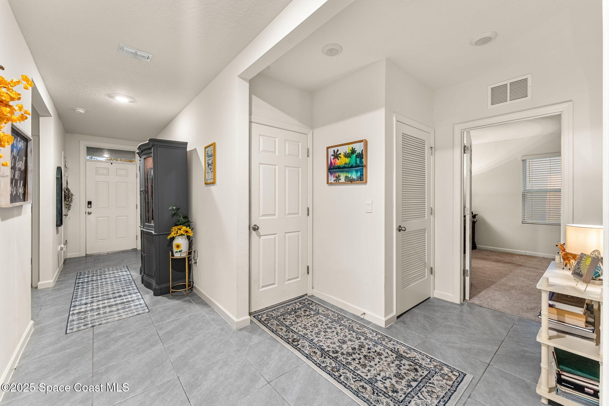 4901 Talbot Boulevard Cocoa, FL 32926 - Photo 8 of 39 a view of livingroom with furniture and window