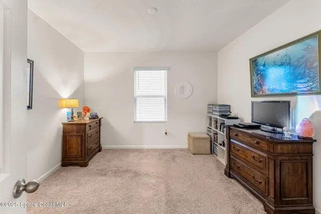 a room with furniture and a window