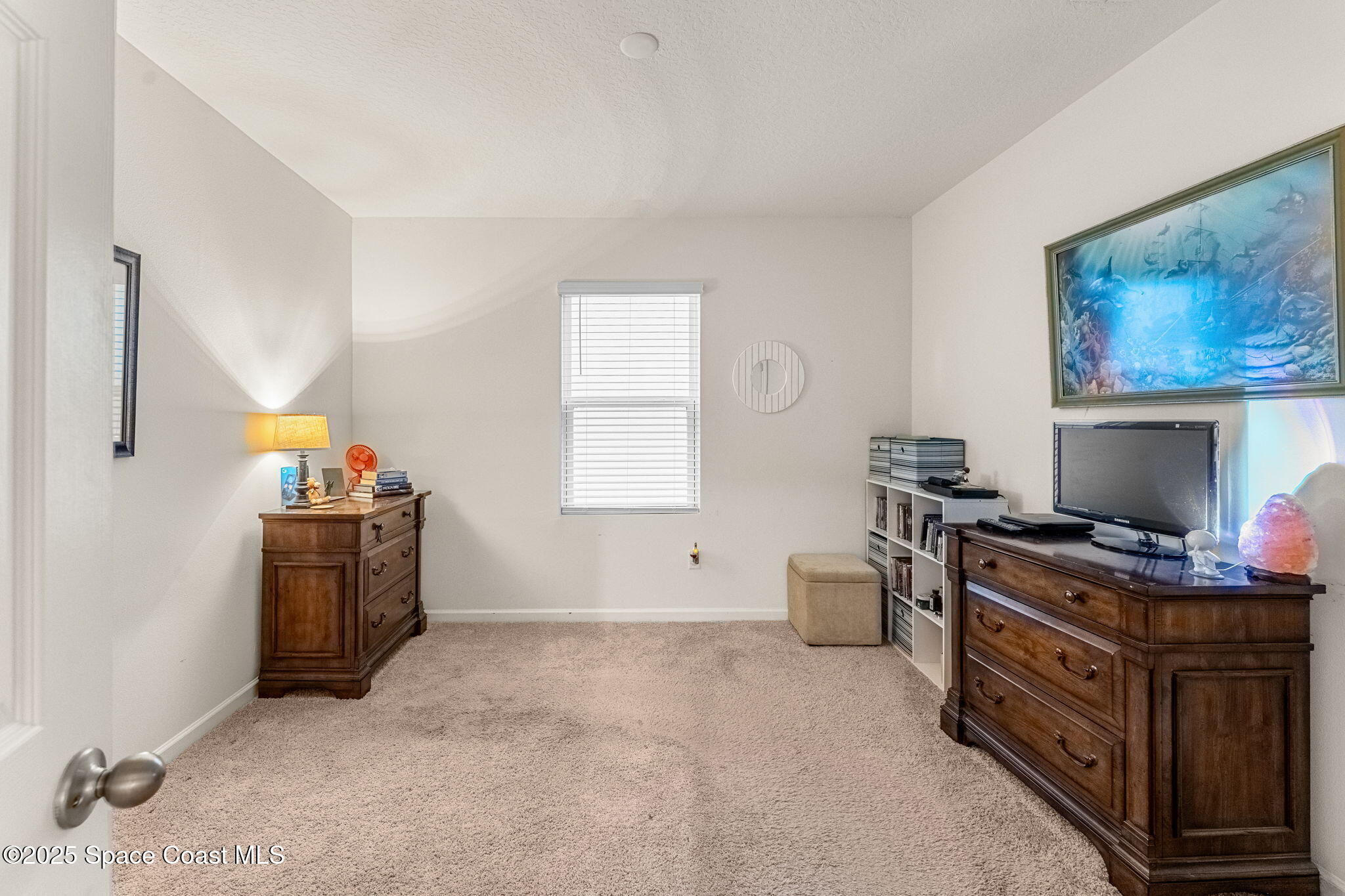 4901 Talbot Boulevard Cocoa, FL 32926 - Photo 9 of 39 a room with furniture and a window