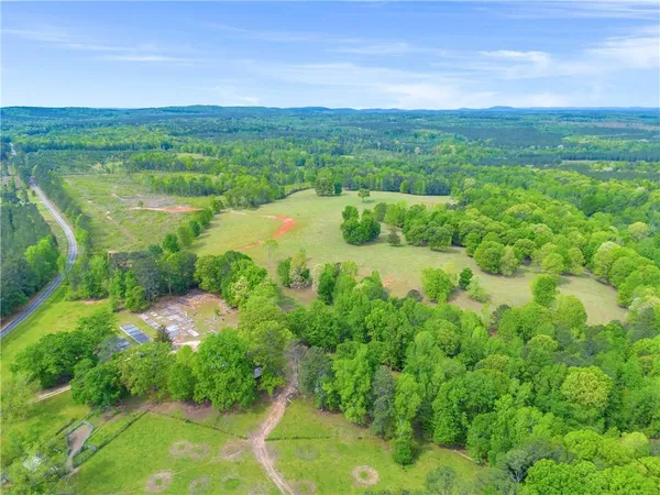 a view of lake with green space