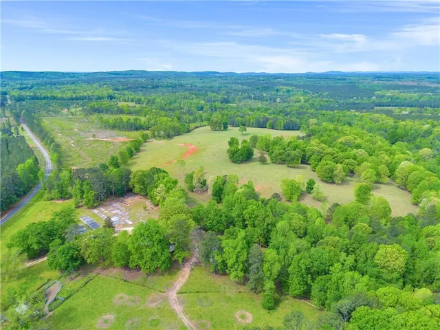 a view of lake with green space