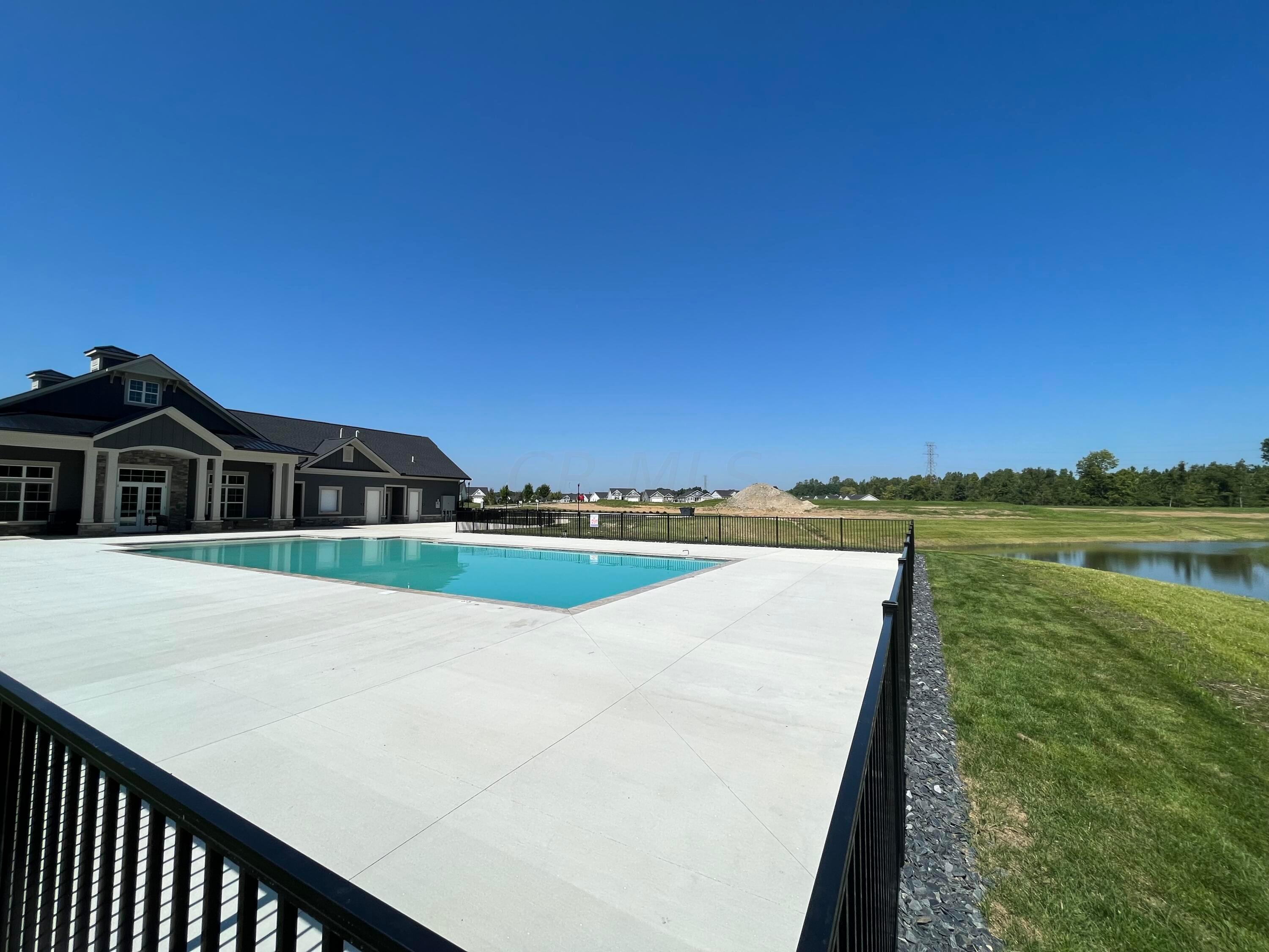 91 Firenze Road Delaware, OH 43015 - Photo 36 of 36 Beyond the Clubhouse and Pool is a lovely pond