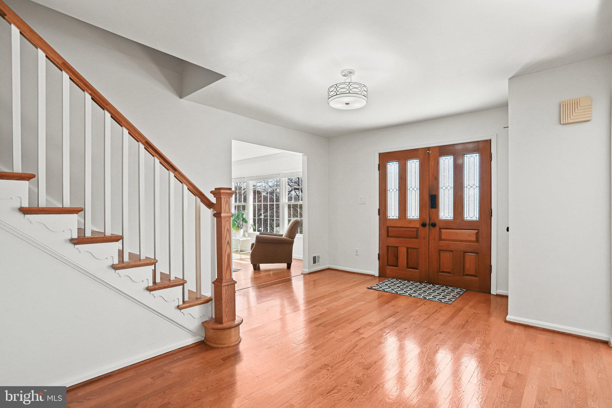 7730 Falstaff Road McLean, VA 22102 - Photo 8 of 59 Gracious Entry With Warm Hardwood Floors