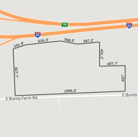 a view of backyard of a house