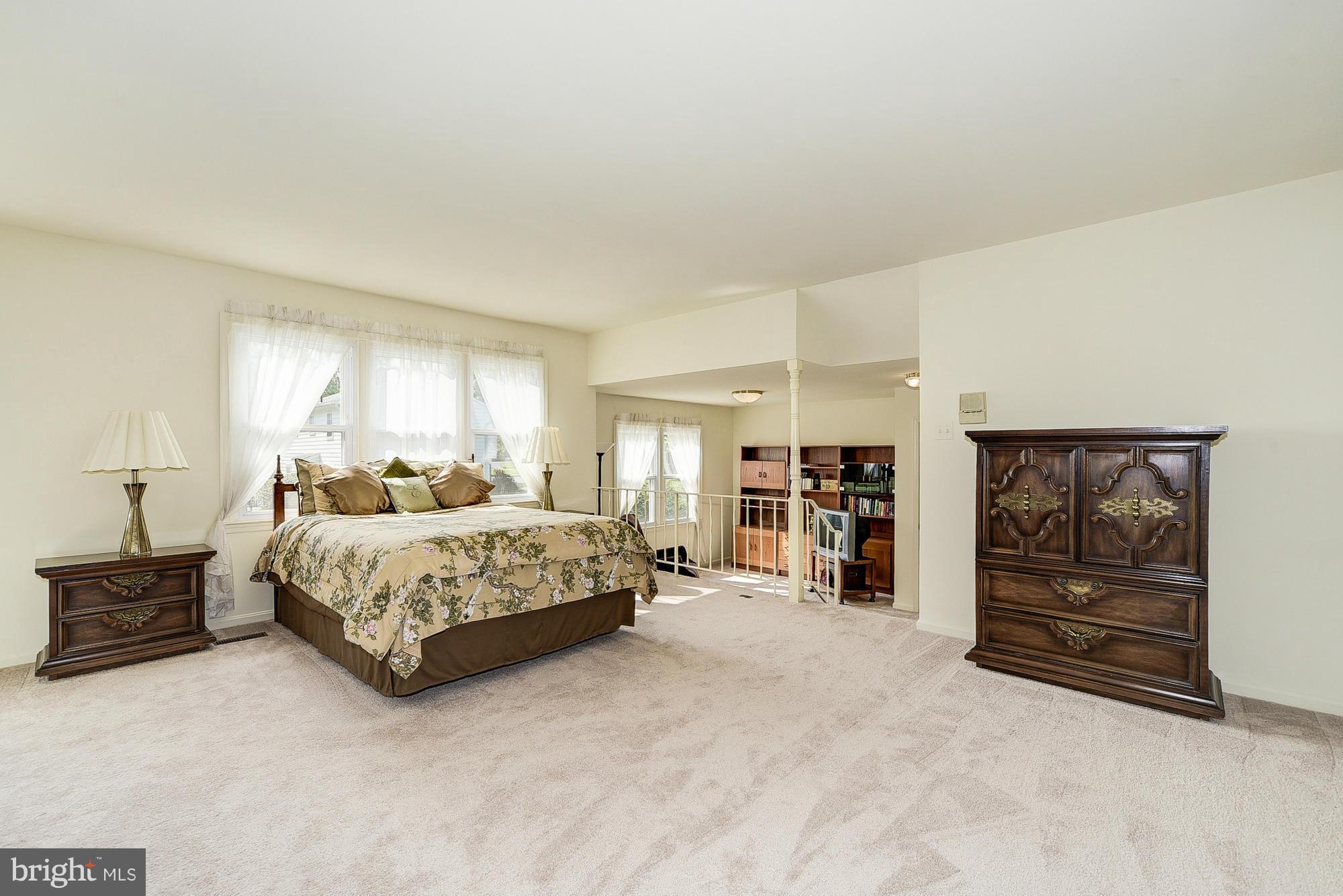 15013 Wellwood Road Silver Spring, MD 20905 - Photo 18 of 30 a living room with furniture and closet