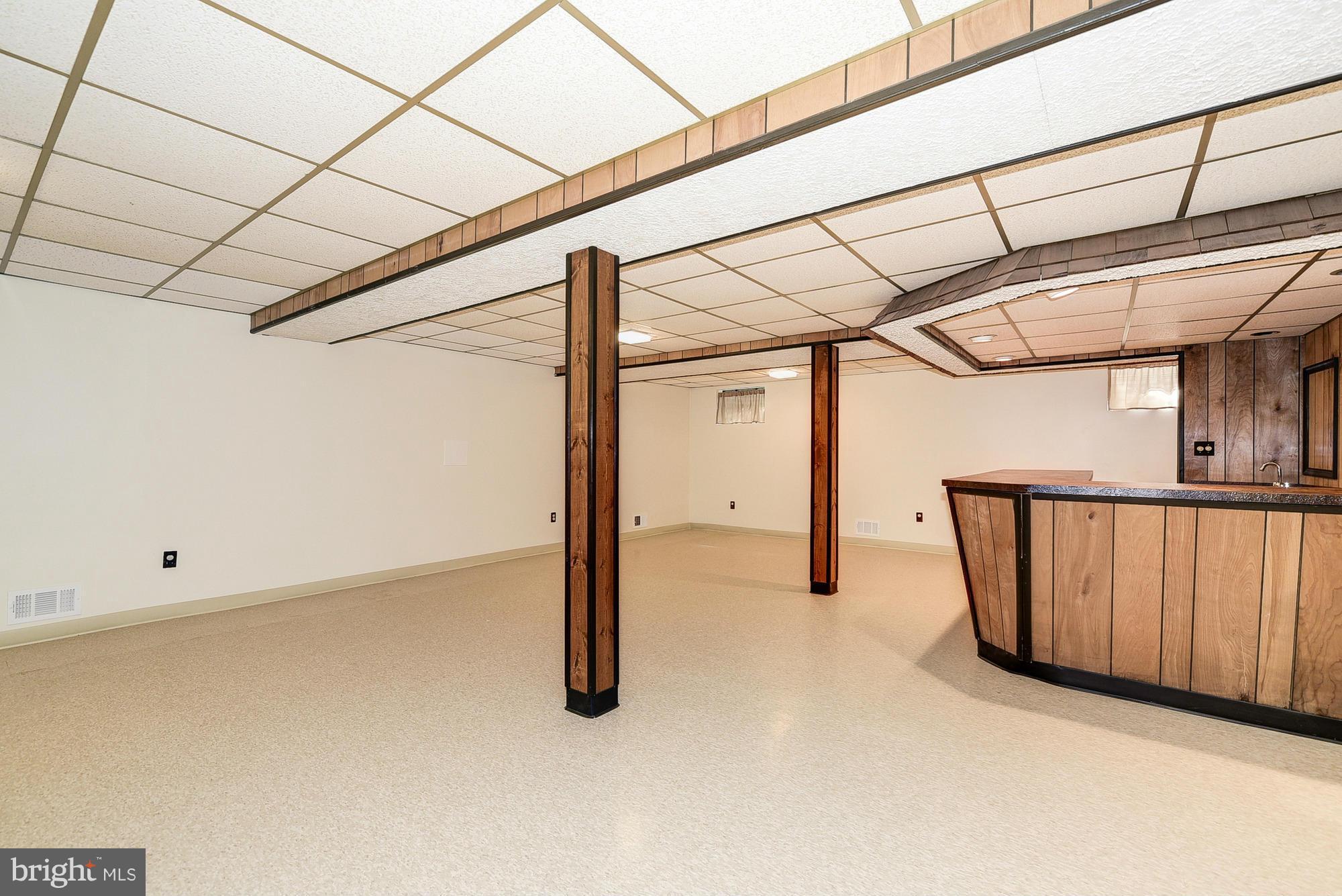 15013 Wellwood Road Silver Spring, MD 20905 - Photo 29 of 30 a view of a room with wooden walls
