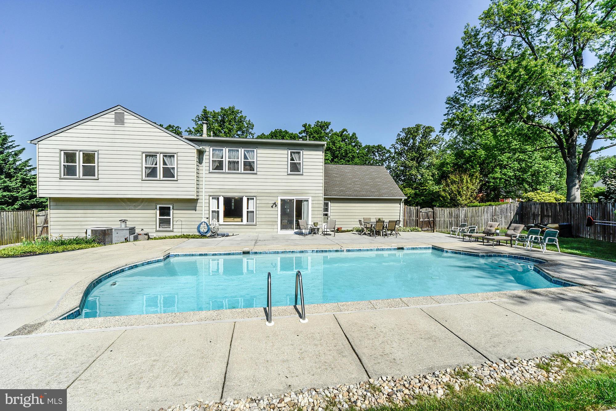 15013 Wellwood Road Silver Spring, MD 20905 - Photo 4 of 30 a view of house with outdoor space and swimming pool