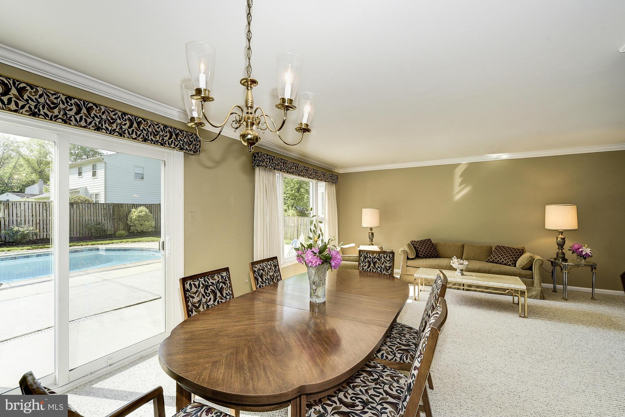 15013 Wellwood Road Silver Spring, MD 20905 - Photo 10 of 30 a view of a dining room with furniture