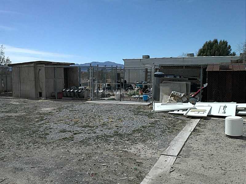 1100 North Blagg Road Pahrump, NV 89060 - Photo 1 of 6 Property Photo. SIDE VIEW WITH MANUFACTURED