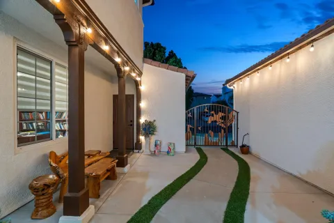 a living room with stainless steel appliances kitchen island granite countertop furniture and a kitchen view