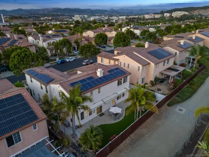 a living room with a bed furniture and a window