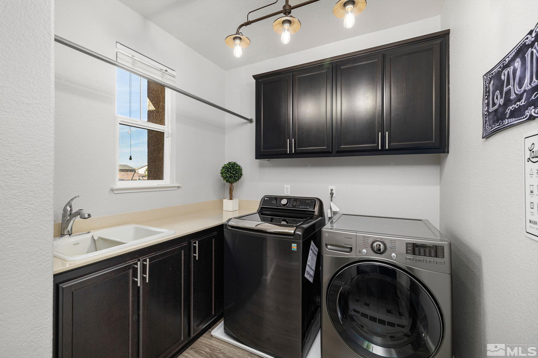 9390 Lost Valley Road Reno, NV 89521 - Photo 21 of 26 a view of a sink and cabinets in a room