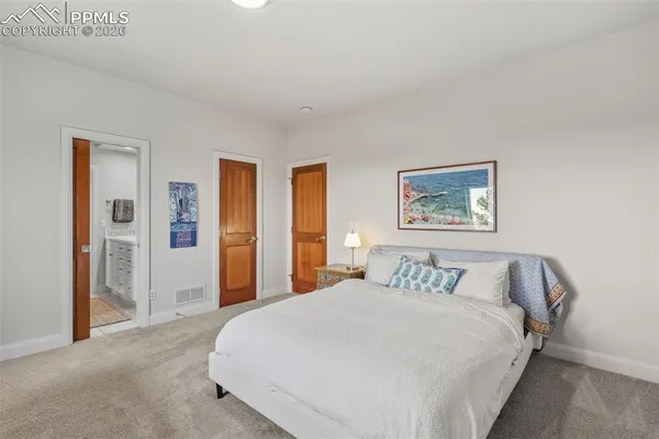 a bedroom with a large bed